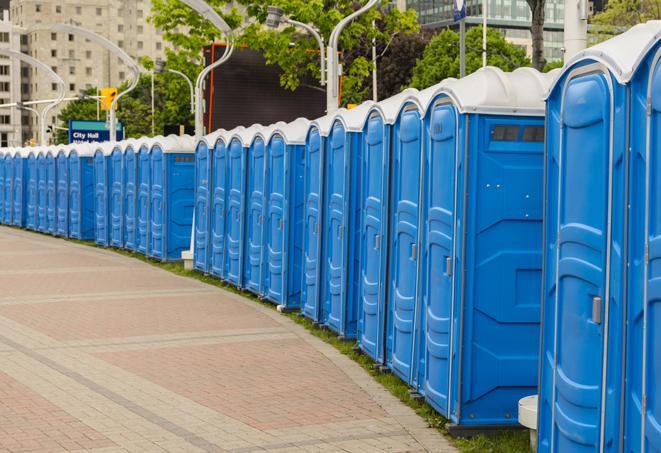 a row of portable restrooms set up for a special event, providing guests with a comfortable and sanitary option in Castro Valley